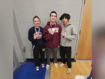 Three UHS wrestlers qualify for state competition